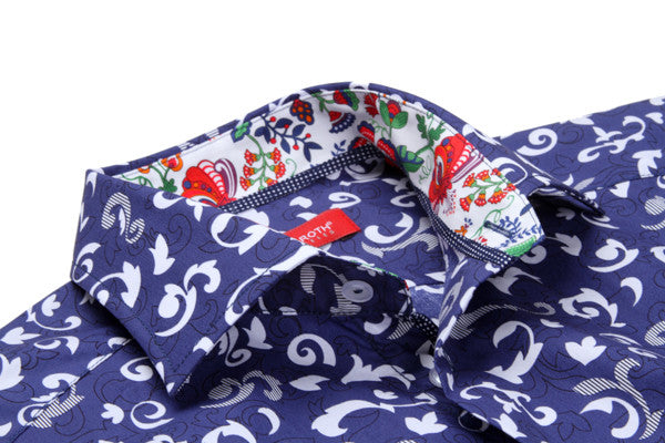 What a "keeper"!! A clean & crisp pattern in 100% cotton for the warm days coming up. The navy and white print is enhanced by a touch of blue, red and green inside the collar and cuffs. While wearing your shirt with the Georg Roth roll of the cuffs, you will appreciate the detail of the blue & white trim on the cuff edges. 
100% Cotton