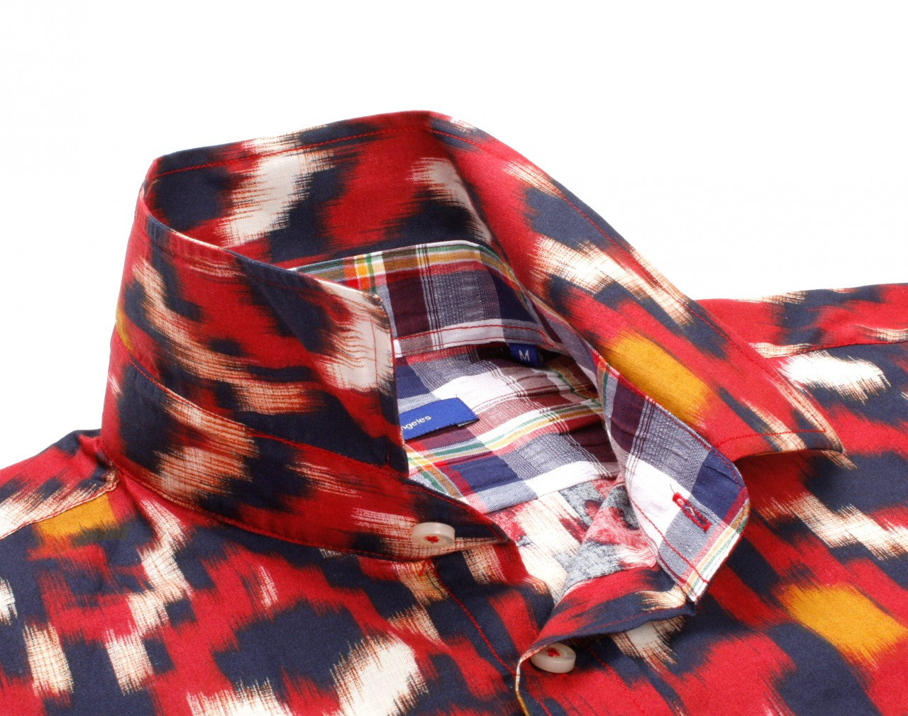 This shirt positively screams summer is here - so don't miss out on our Como short sleeve shirt by Designer Georg Roth. The red fantasy print is contrasted with a multicolor plaid inside the collar and inside saddle. Details include one breast pocket on left side. All seams are done to perfection with stitching in red. 100% Cotton 