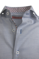 This blue tonal woven all over pattern is striking and sophisticated with a fun mix of pattern play inside the collar and cuffs. 
A luxury timeless that you will enjoy daytime or going out!
100% Cotton 
Machine wash or dry clean