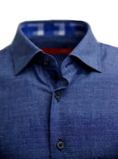 Super soft Pima Cotton in a rich denim  blue with a mini tone on tone pattern. For business, casual or dress this shirt is so versatile, if rolling the sleeves or under a jacket, you will enjoy the many compliments! Detailed with a cool pattern in blues and grays inside the collar stand and cuffs along with a very small piping inside the front placket. 
Soft Collar with hidden button down detail for the perfect shape
100% Cotton
1 Breast pocket
Machine wash cold hang to dry or dry clean 