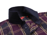 The bold long sleeve plaid shirt in eggplant, blue and beige is detailed with a dark blue contrast on the whole collar, inside front placket and cuffs. The Georg Roth LA City model is characterized by features such as high 2 button collar stand and button-down collar. All seams are done to perfection with stitching in dark blue. 100% Cotton